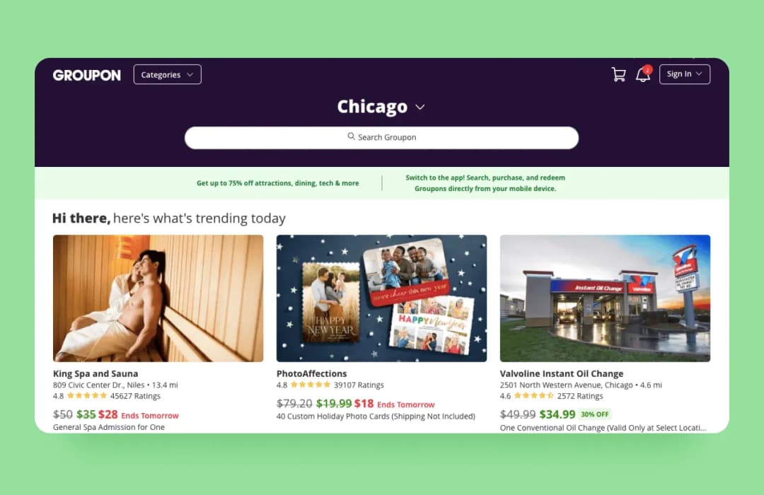 Groupon Chicago homepage showing trending deals for spa, photo cards and Valvoline oil change