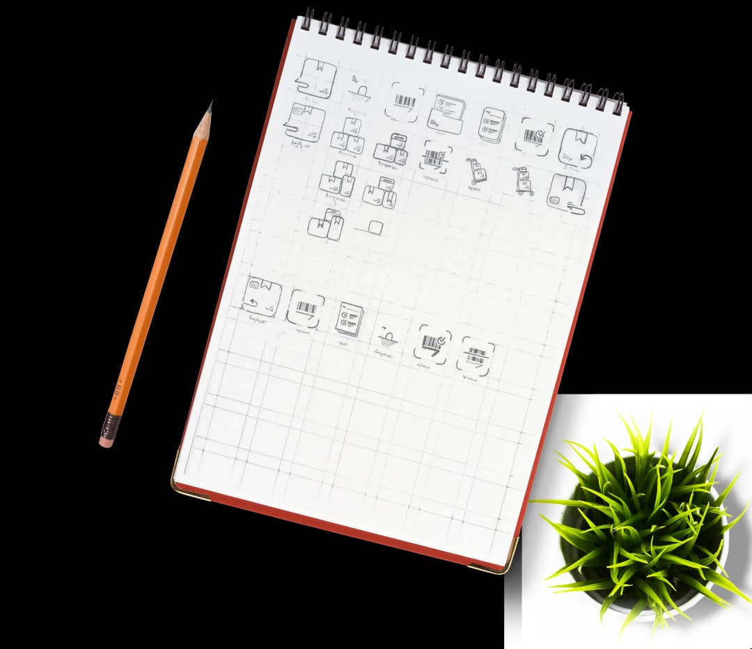 Sketches of app icons on notebook paper