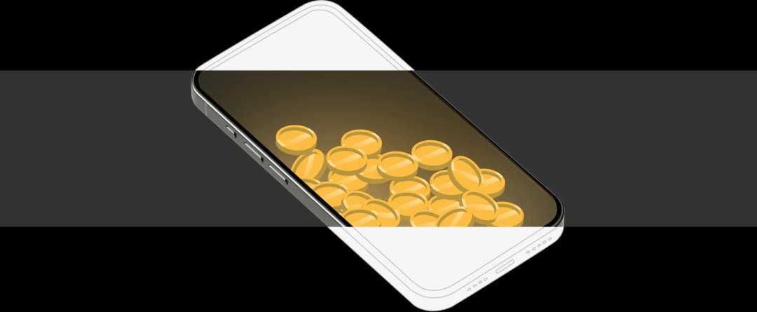 Mobile phone displaying yellow balls inside screen