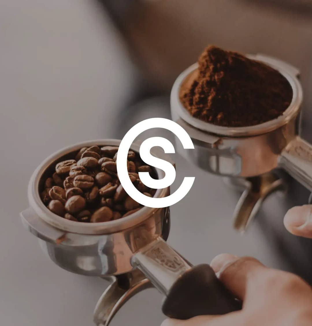 Coffee beans and ground coffee in portafilter