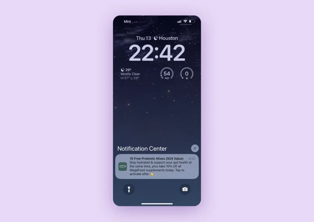 A screenshot of an iPhone home screen showing a notification with a special discount for probiotics.