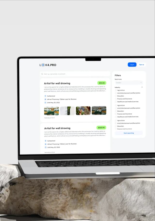 Laptop displaying an artist listing page
