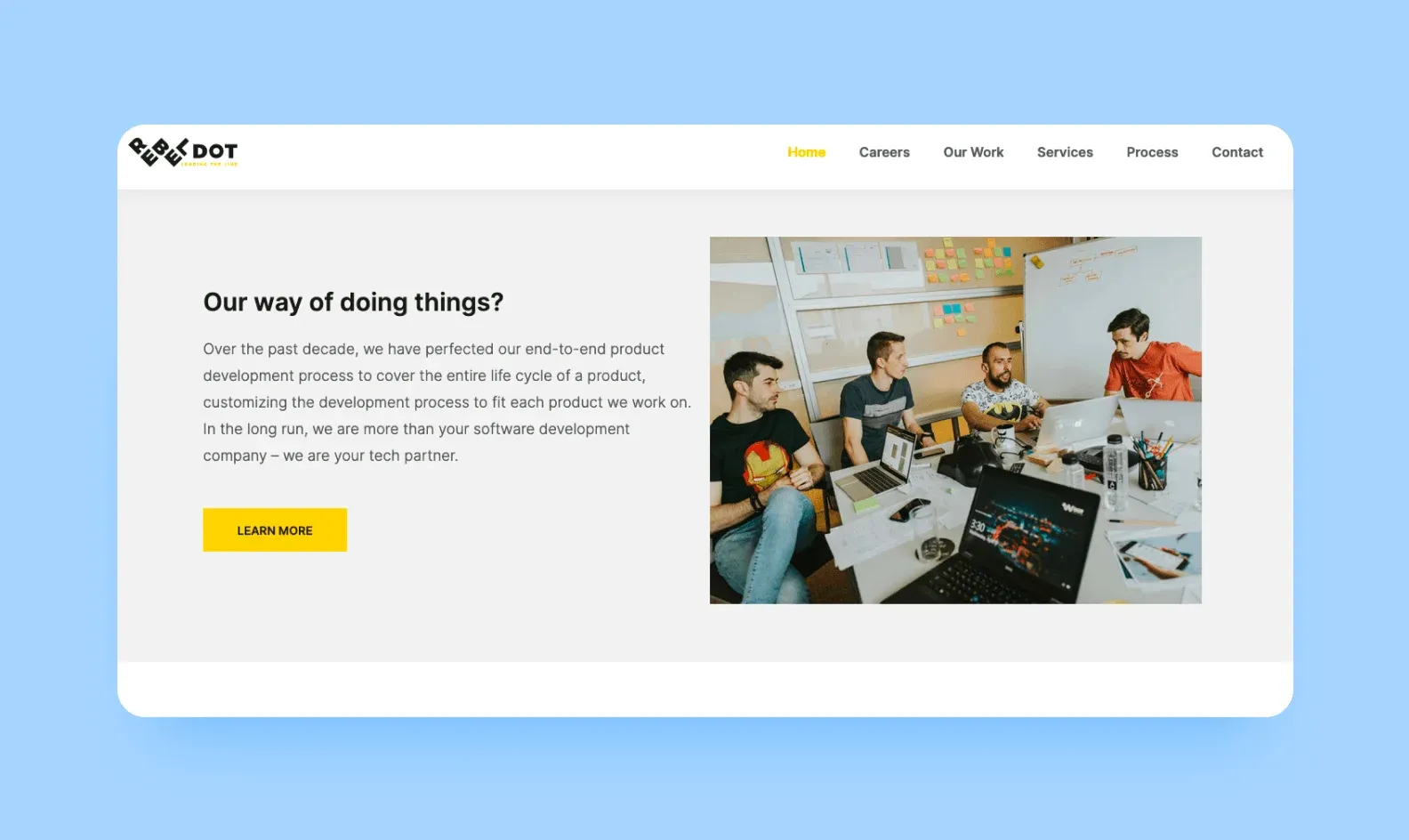 RebelDot website Our way of doing things with team photo around laptops