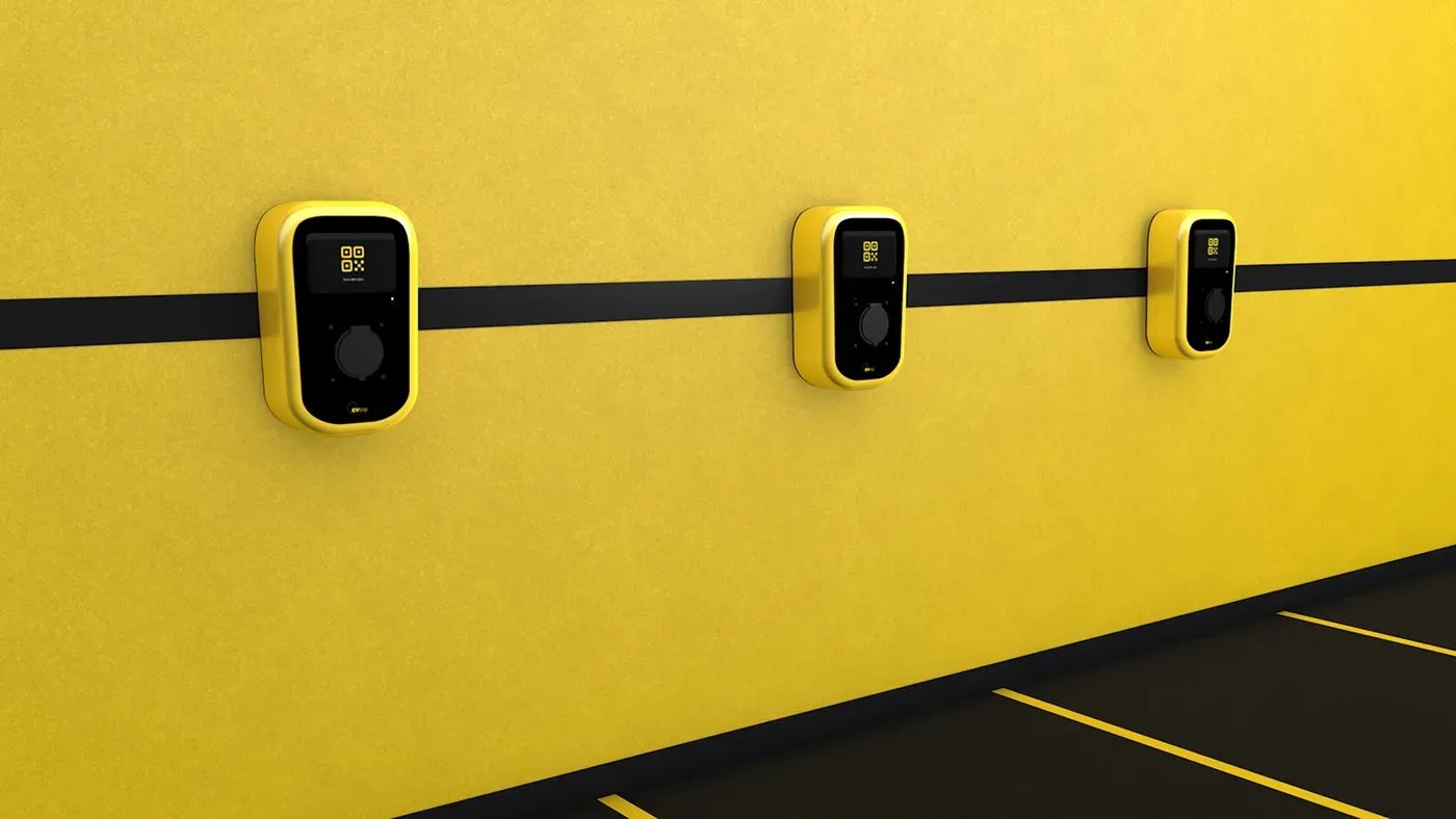 Electric vehicle chargers on yellow wall