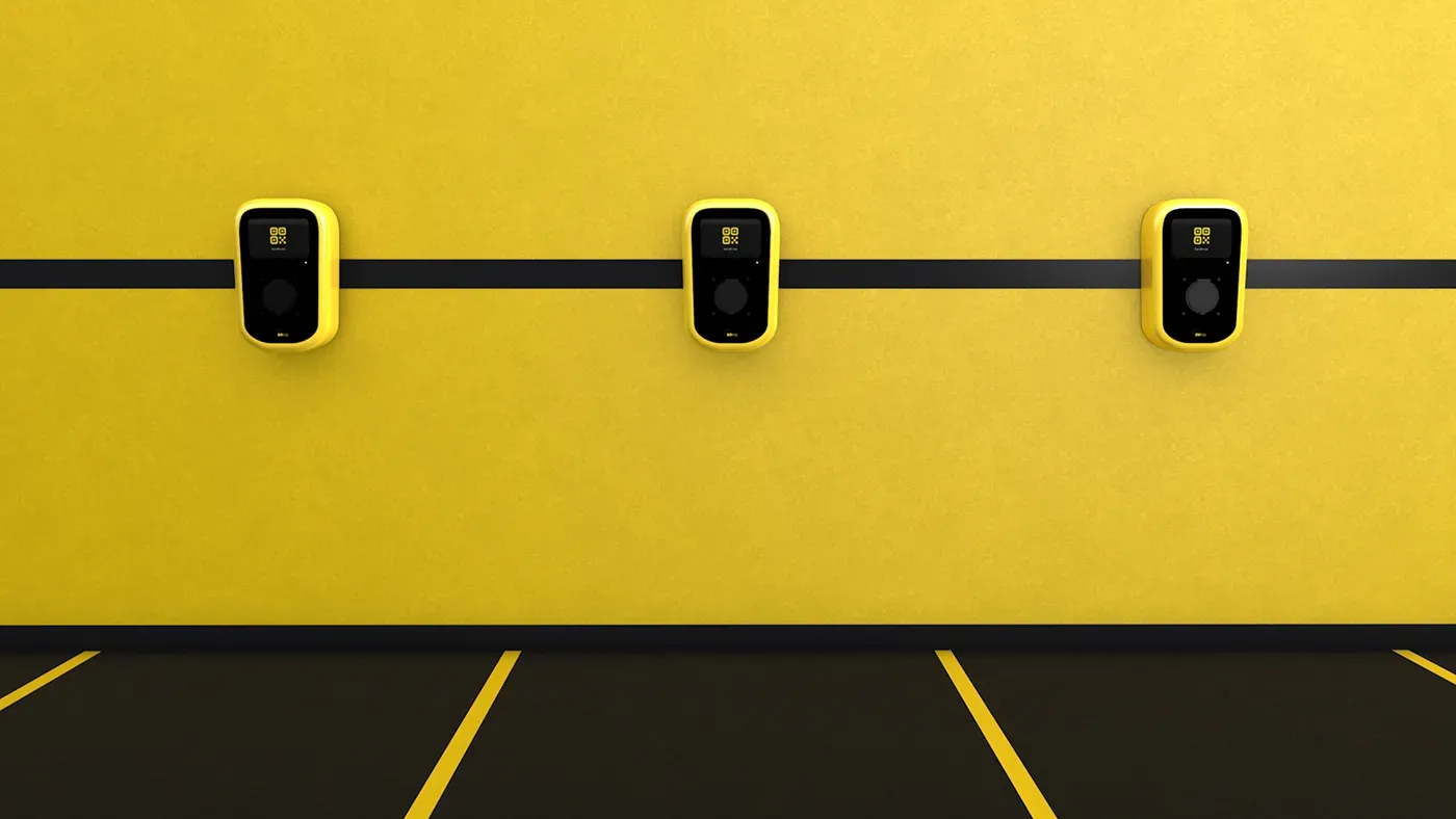 Electric vehicle charging stations on yellow wall